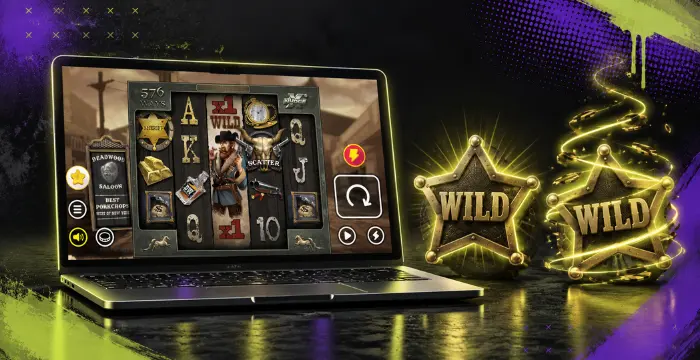 Laptop showing Deadwood slot with two glowing wild sheriff badges