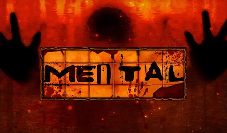 Mental slot game logo with dark horror themed background