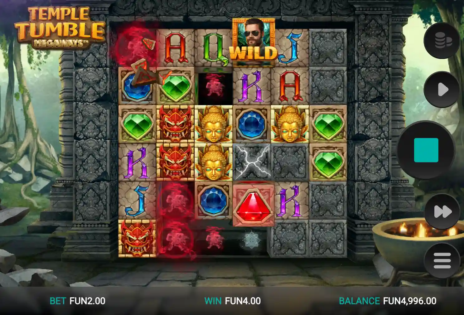 Temple Tumble Megaways slot with Wild symbol, gems, Buddha icons, and FUN4.00 win